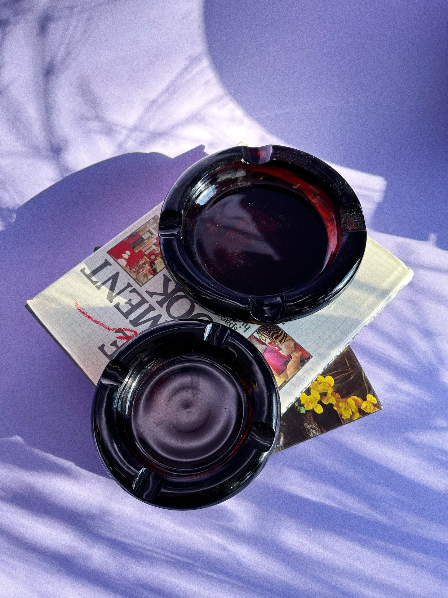 Vintage Heavy Nesting Pair of Mid Century Modern Dark Amber Glass Ashtrays