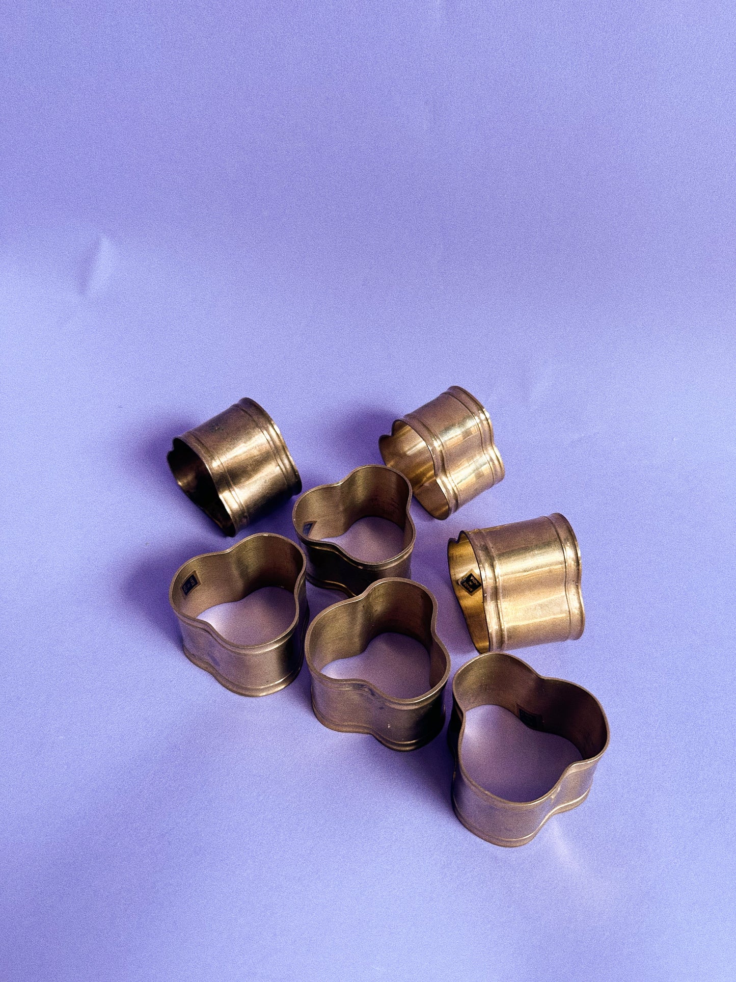 Vintage Set of 7 Brass Napkin Rings