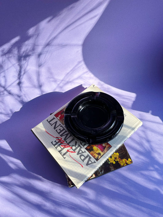 Vintage Heavy Nesting Pair of Mid Century Modern Dark Amber Glass Ashtrays